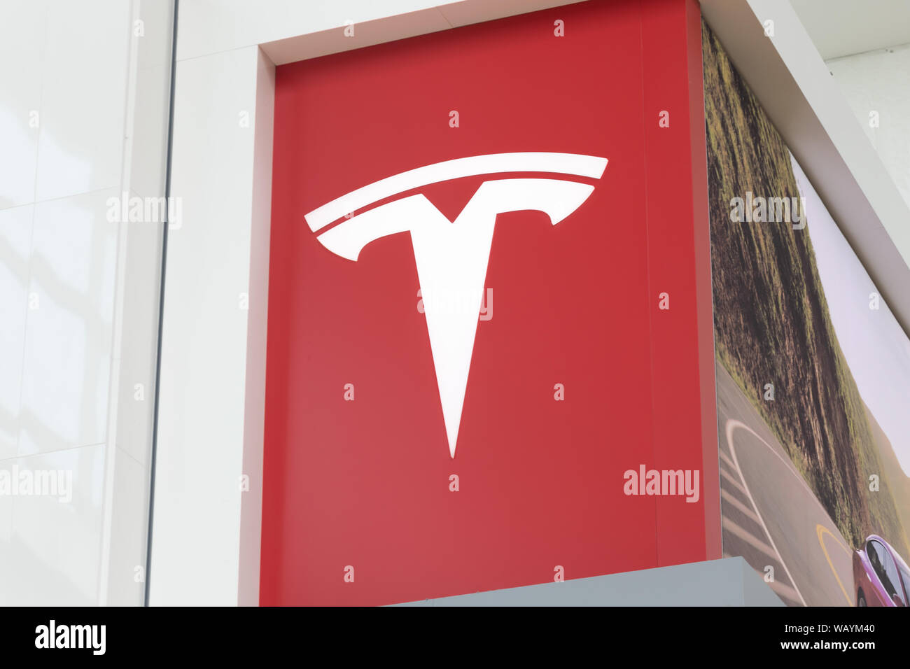 Closeup of Tesla logo atop of the Tesla Store in Toronto's Yorkdale Shopping Centre. Stock Photo