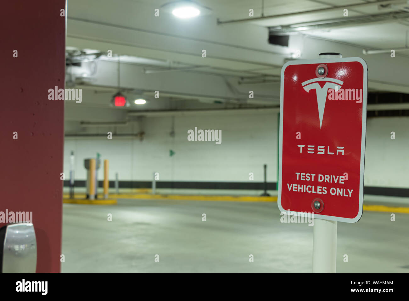 'Tesla Test Test Drive Vehicle Only' sign in a underground parking lot below the Tesla Store at Yorkdale Shopping Centre. Stock Photo