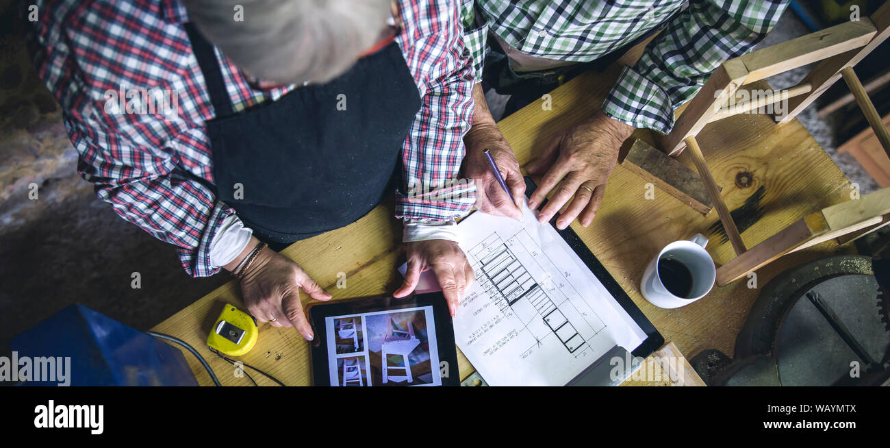 Senior couple in a carpentry Stock Photo