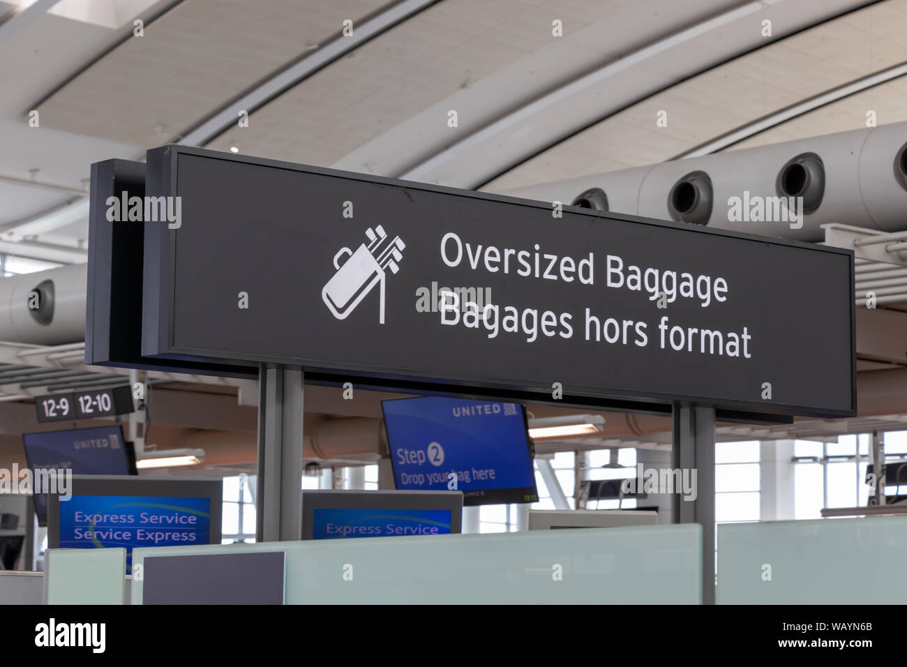 Oversized Baggage sign (English/French) in Terminal 1 at Toronto Pearson Int’l Airport. Stock Photo