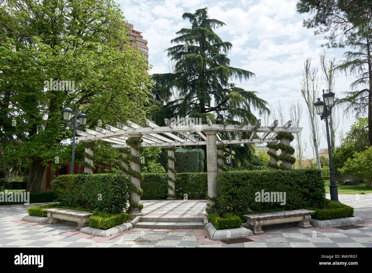 MADRID, SPAIN - APRIL 23, 2018: Old pergola in the Gardens of Cecilio Rodriguez, located inside the Retiro Park in Madrid, Spain. Stock Photo