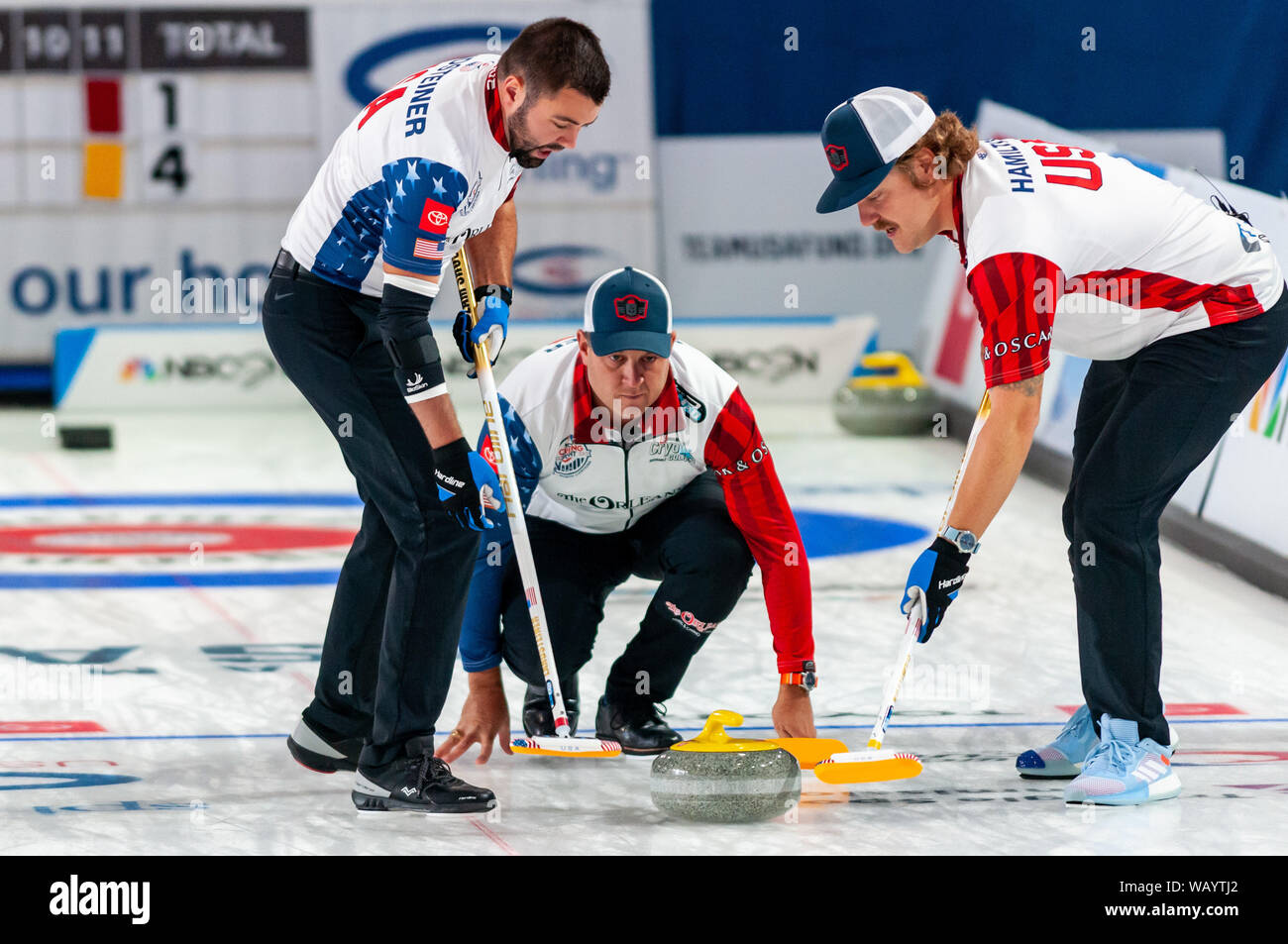 Raleigh, North Carolina, USA. 22nd Aug, 2019. Aug. 22, 2019 Ã RALEIGH, N.C., US - JOHN LANDSTEINER, JOHN SHUSTER, and MATT HAMILTON of the United States in action during Curling Night in America at the Raleigh Ice Plex. Curling Night in America featured members of the U.S. Olympic menÃs gold medal team from the 2018 Winter Olympics in South Korea U.S. womenÃs team, as well as teams from Italy, Japan, and Scotland, Aug. 22-24, 2019. Credit: Timothy L. Hale/ZUMA Wire/Alamy Live News Stock Photo