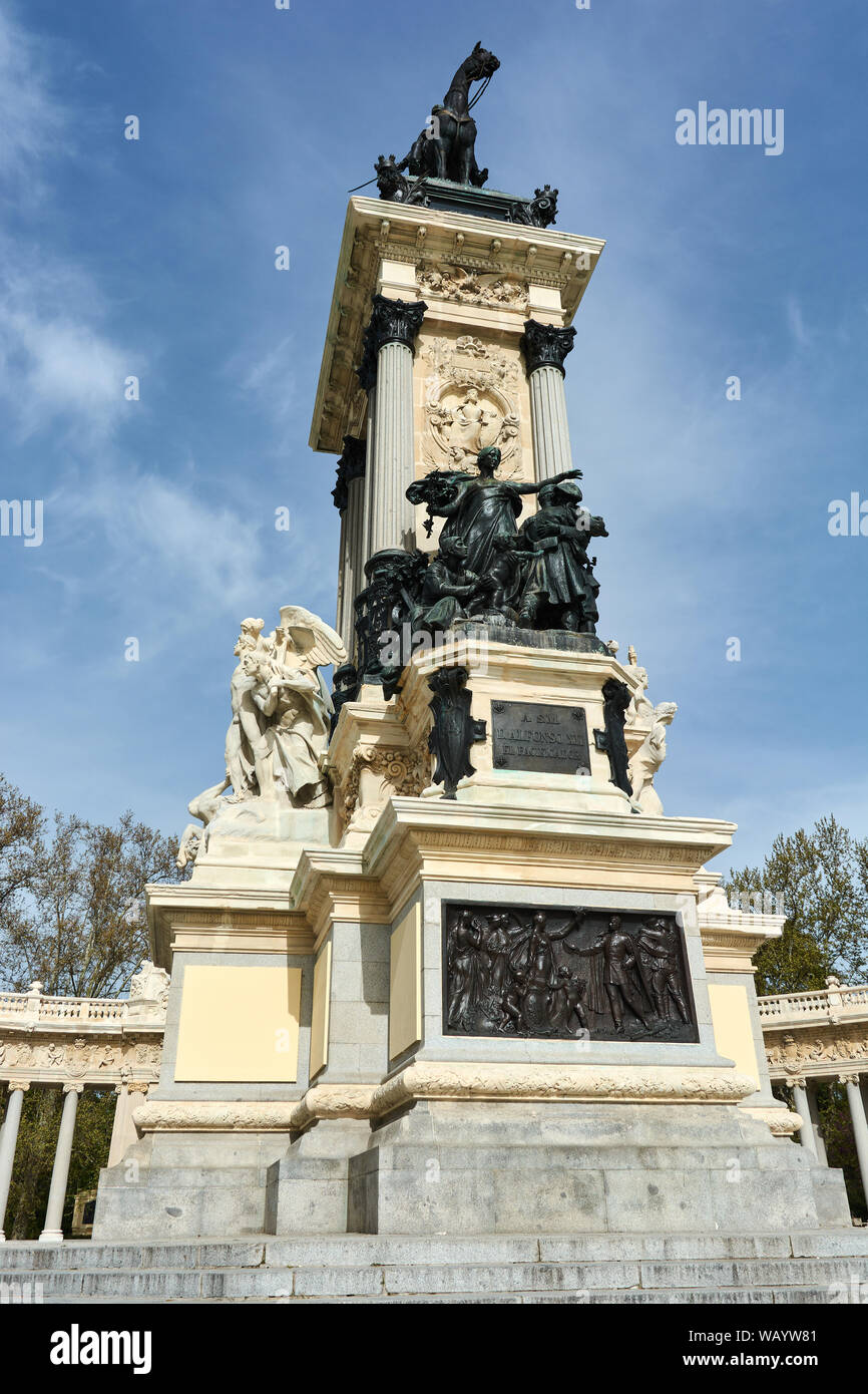 MADRID, SPAIN - APRIL 23, 2018: Front view of the main pedestal of the Monument to the King Alfonso XII in the Retiro Park, Madrid, Spain. Stock Photo