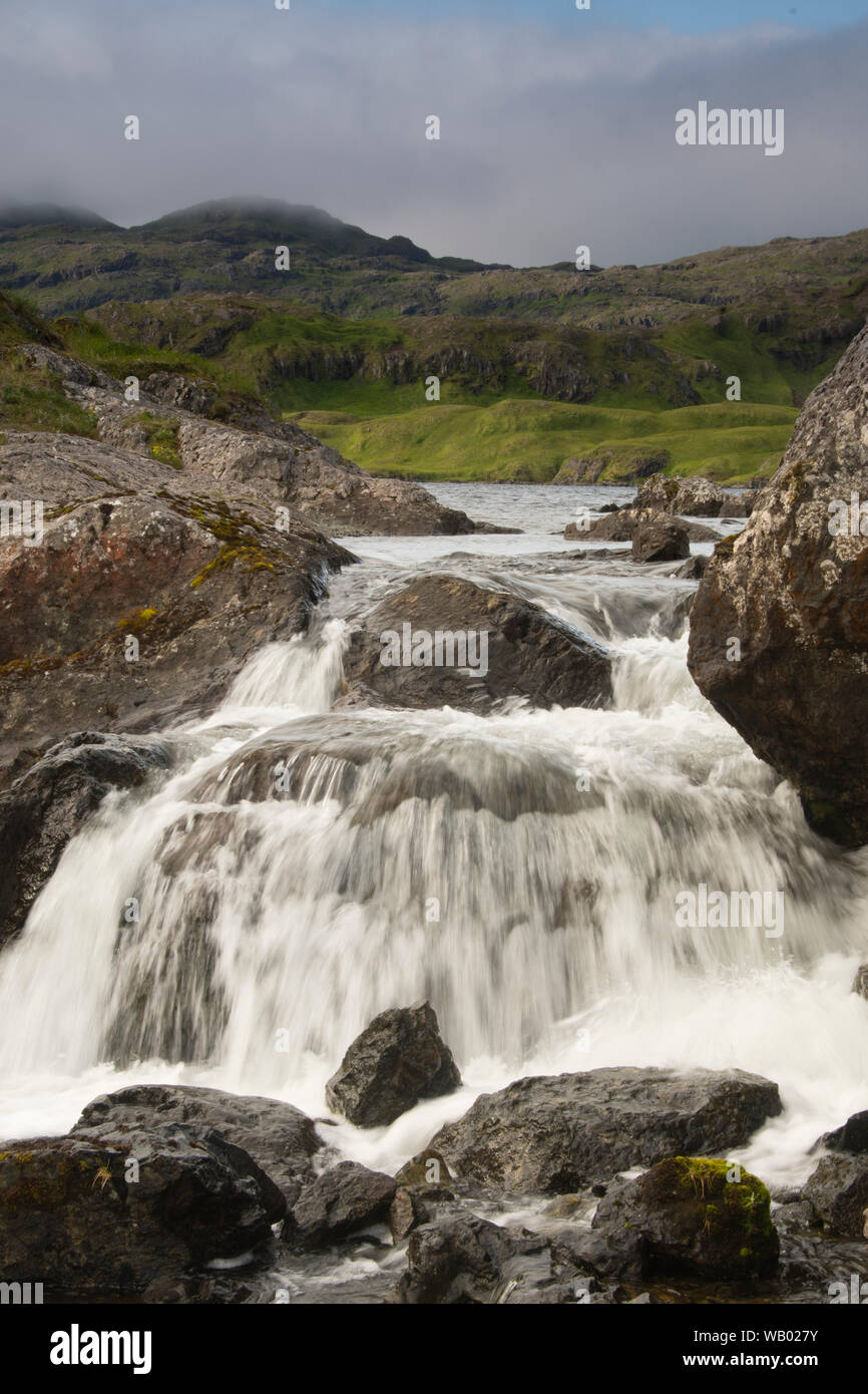 Waterfall above Finger Bay, Adak Island, Aleutian Islands, Alaska Stock