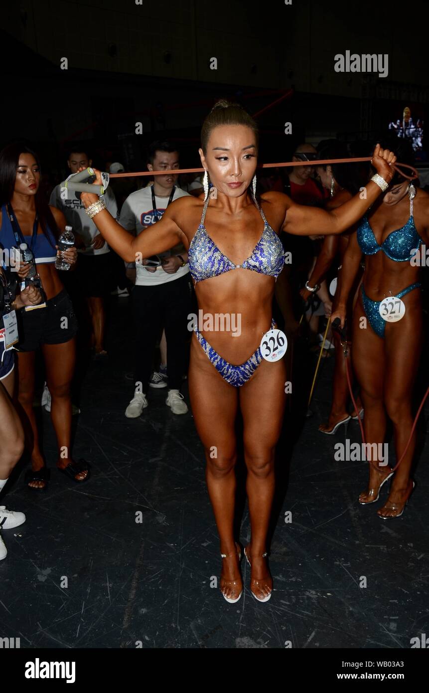 Shanghai, Shanghai, China. 23rd Aug, 2019. Shanghai, CHINA-FIBOCHINA2019  international fitness and healthy lifestyle exhibition opens at Shanghai  national convention and exhibition center on August 22, 2019.Now, many  bodybuilding talent, hot beauty ...