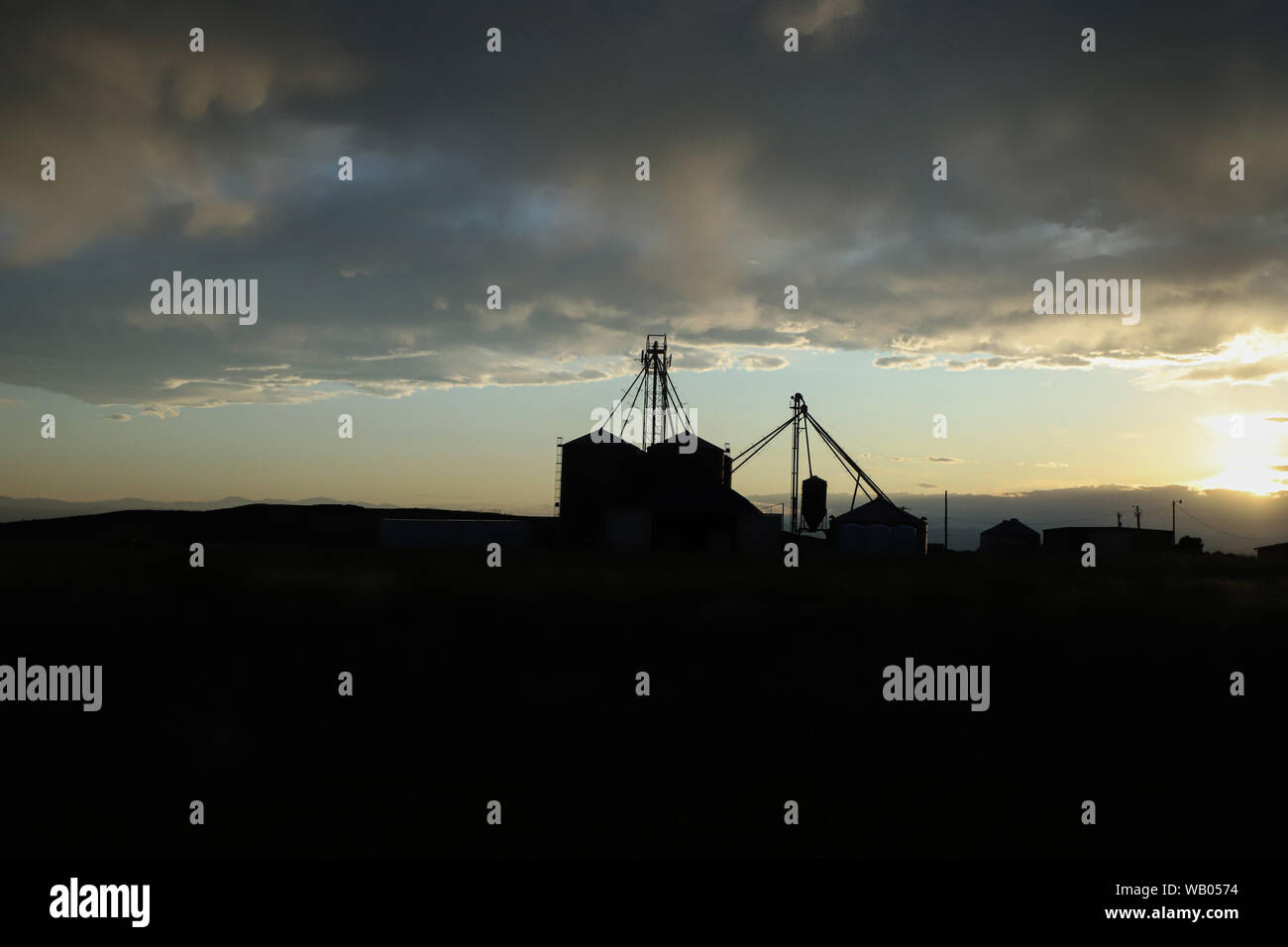 Silo and Grain Equipment Silhouette in Field Stock Photo Alamy