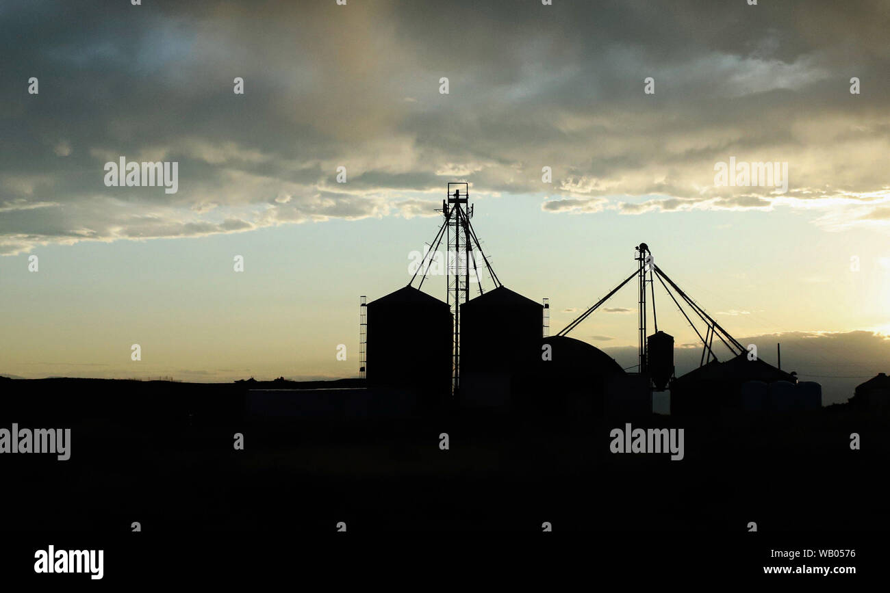 Silo and Grain Equipment Silhouette in Field Stock Photo Alamy