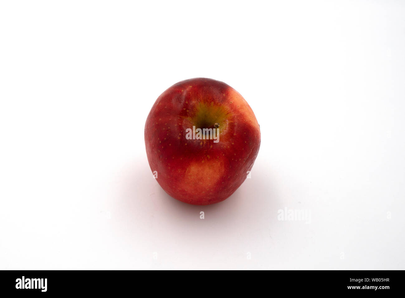 Fresh whole of royal gala red apple isolated on white background. Top