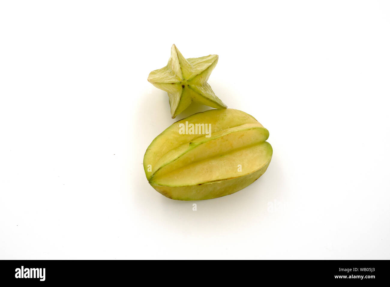 Fresh star fruits isolated on white background. Healthy green fruits. Tropical fruit. Stock Photo