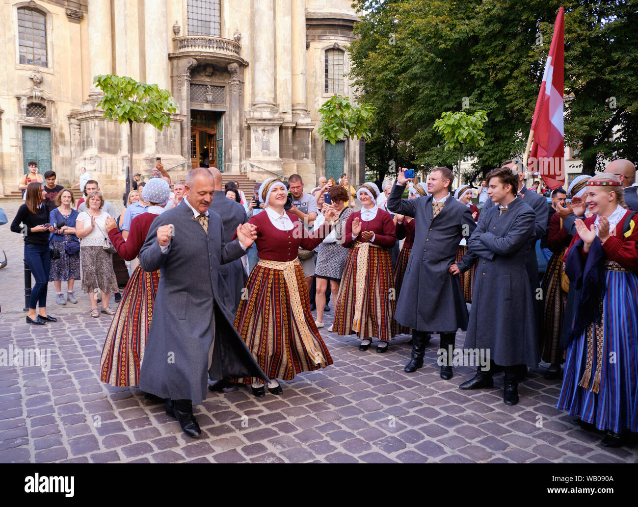 Latvian Folklore group in traditional costumes dancers performing ...