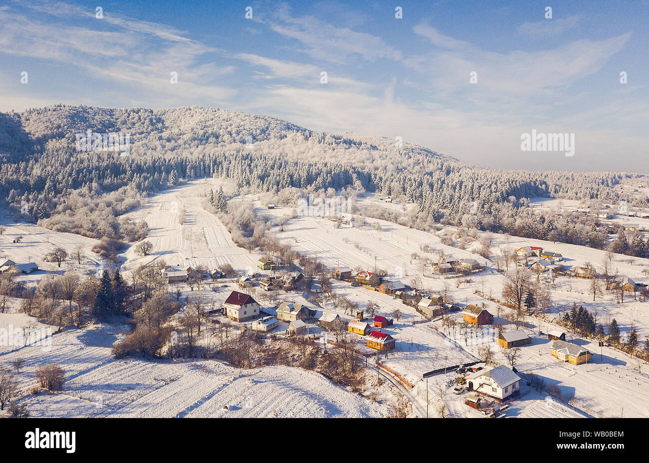 aerial view of a small town in the mountains during winter Stock Photo ...