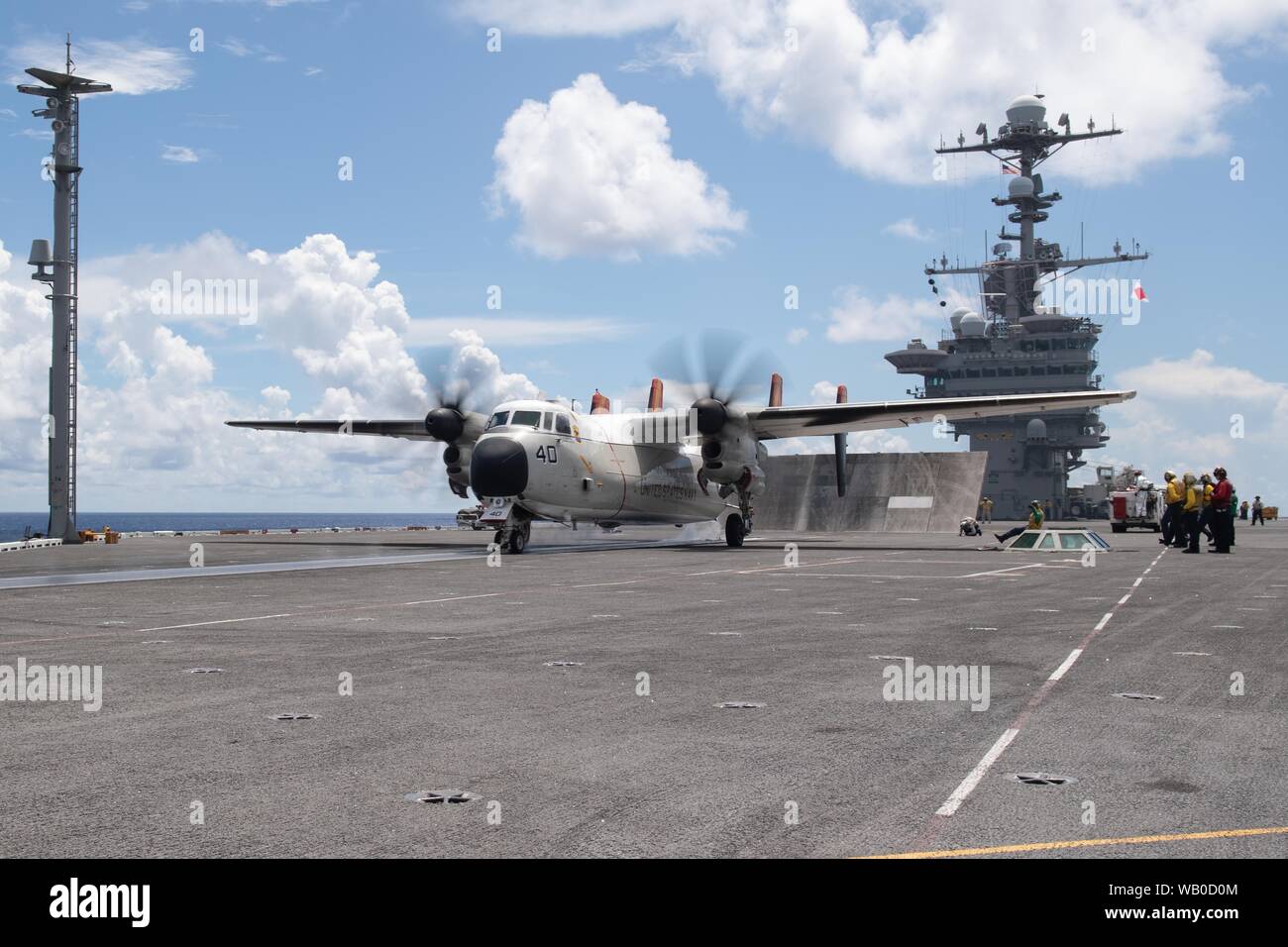 U.S. Navy C-2A Greyhound, assigned to Fleet Logistics Combat Support Squadron (VRC) 40, launches off the flight deck of the aircraft carrier USS John C. Stennis (CVN 74) in the Atlantic Ocean, Aug. 21, 2019. The John C. Stennis is underway conducting routine operations in support of Commander, Naval Air Force Atlantic. (U.S. Navy photo by Mass Communication Specialist 3rd Class Rebekah M. Rinckey) Stock Photo