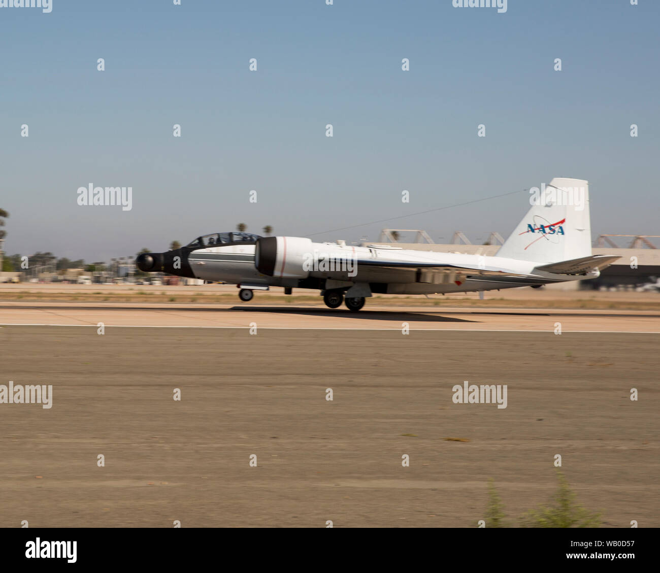 A NASA WB-47 takes off from the flight line of Marine Corps Air Station Miramar, Calif., Aug. 21. The aircraft was utilizing the MCAS Miramar flight line and airspace to test new communications software. (U.S. Marine Corps photo by Lance Cpl. Jose GuerreroDeleon) Stock Photo