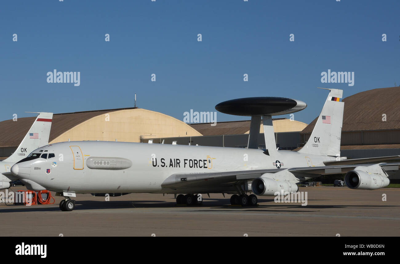 Boeing E-3G Airborne Warning and Control System aircraft, serial # 79-0001, wearing markings for the 552nd Air Control Wing Commander in the form of multi-colored tail-stripe, shadowed tail code and serial number markings on Aug. 12, 2019, Tinker Air Force Base, Oklahoma. The 55nd Air Control Wing, Air Combat Command, generates E-3 AWACS aircraft and crews to support 12th Air Force, Air Forces Southern and combatant commanders around the world. The 552nd ACW is known as 'American's Wing' as the largest wing within ACC. (U.S. Air Force photo/Greg L. Davis) Stock Photo