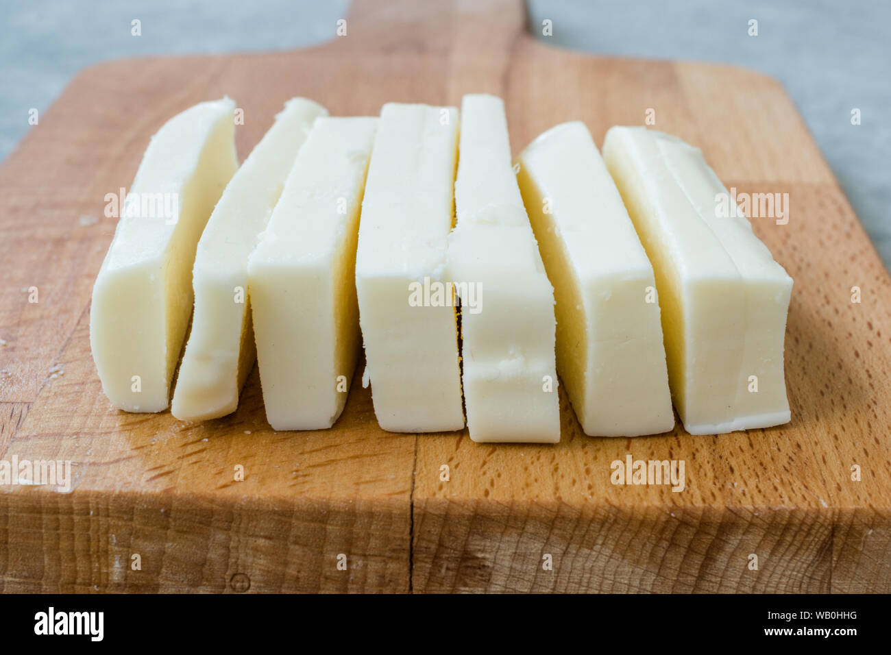 String Cheese Slices for a Snack / Turkish Dil Peyniri. Traditional Organic Food. Stock Photo