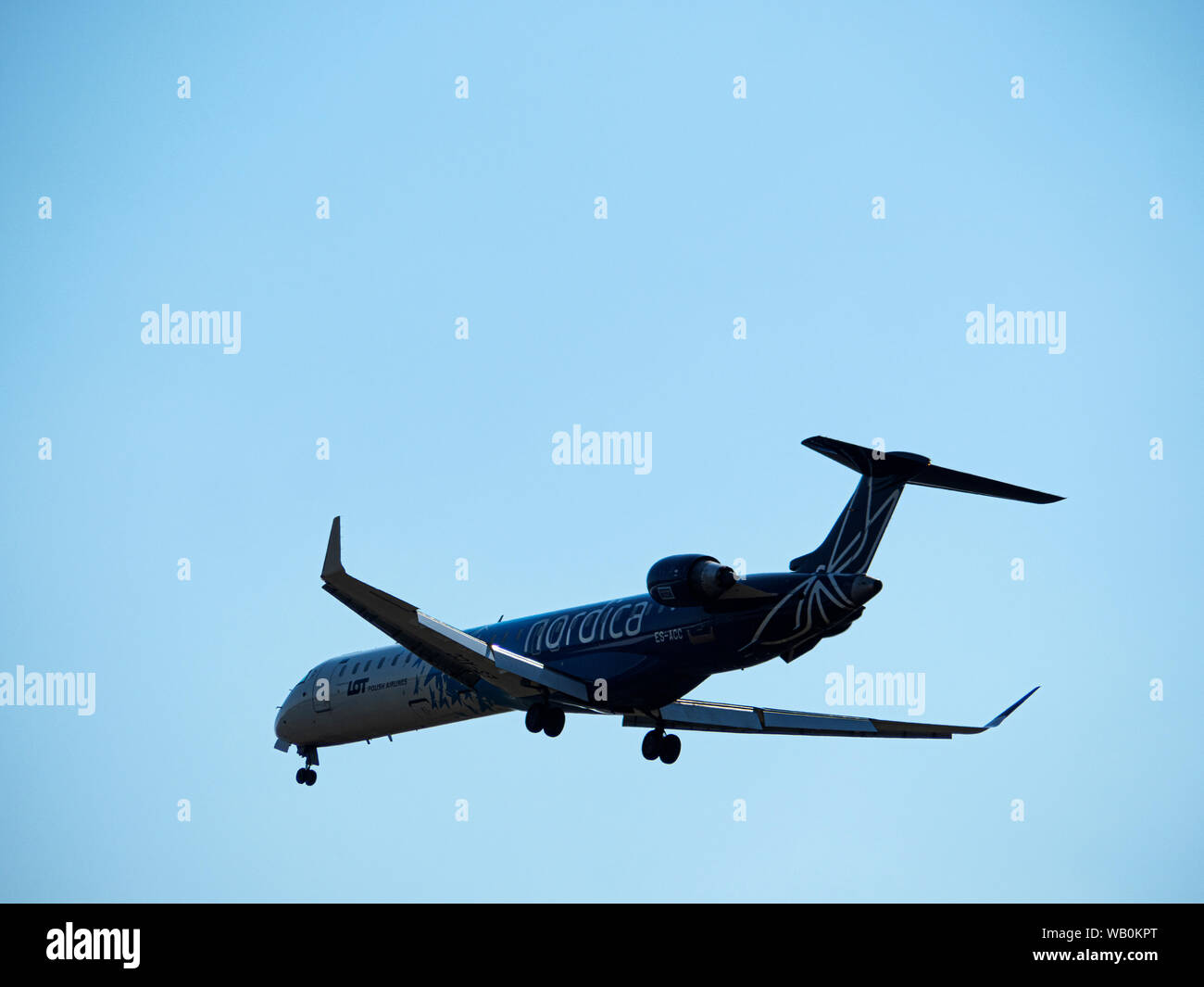 White aircraft bombardier crj hi-res stock photography and images - Alamy