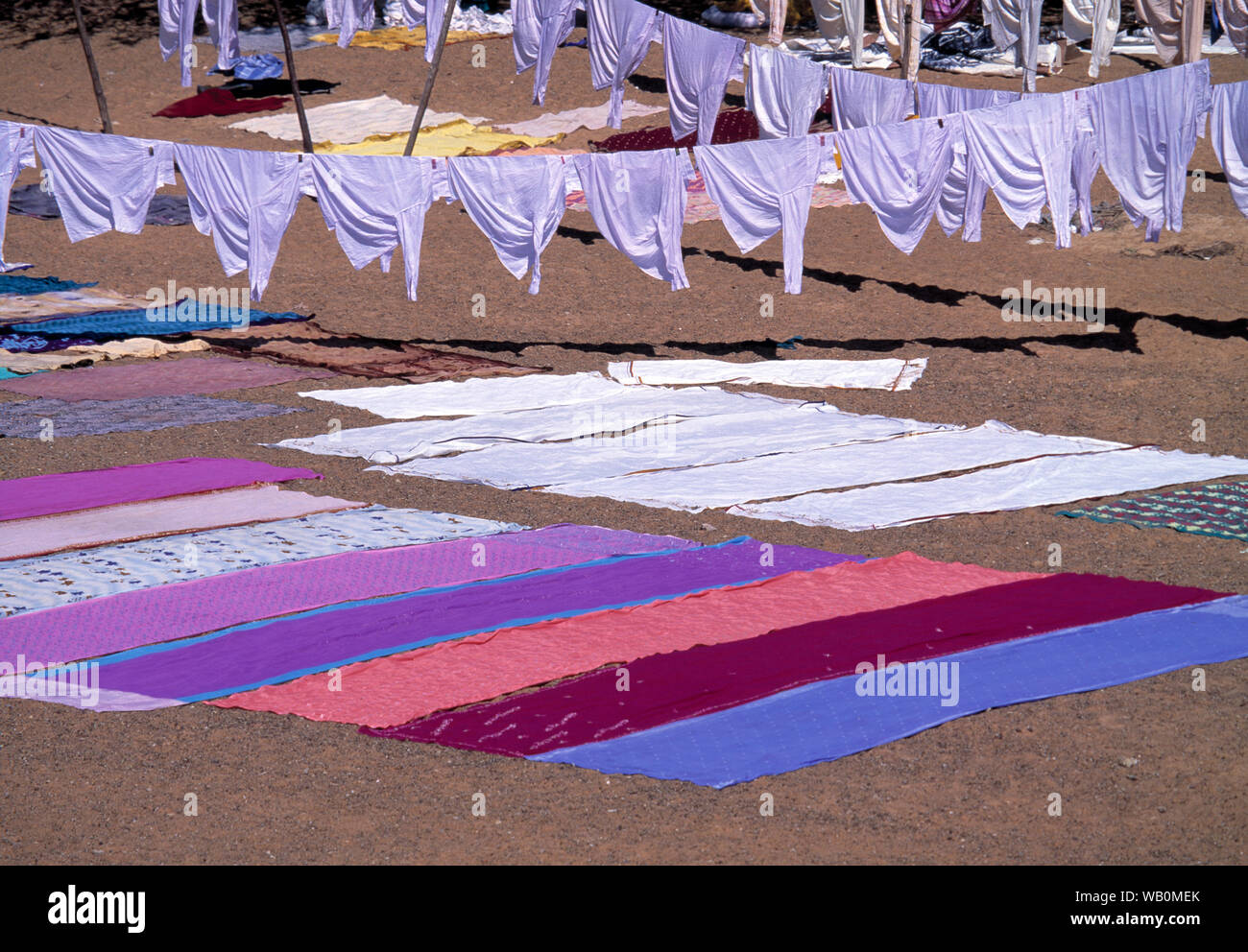 asia, asian, india, selection of batik coloured garments drying in the sun Stock Photo