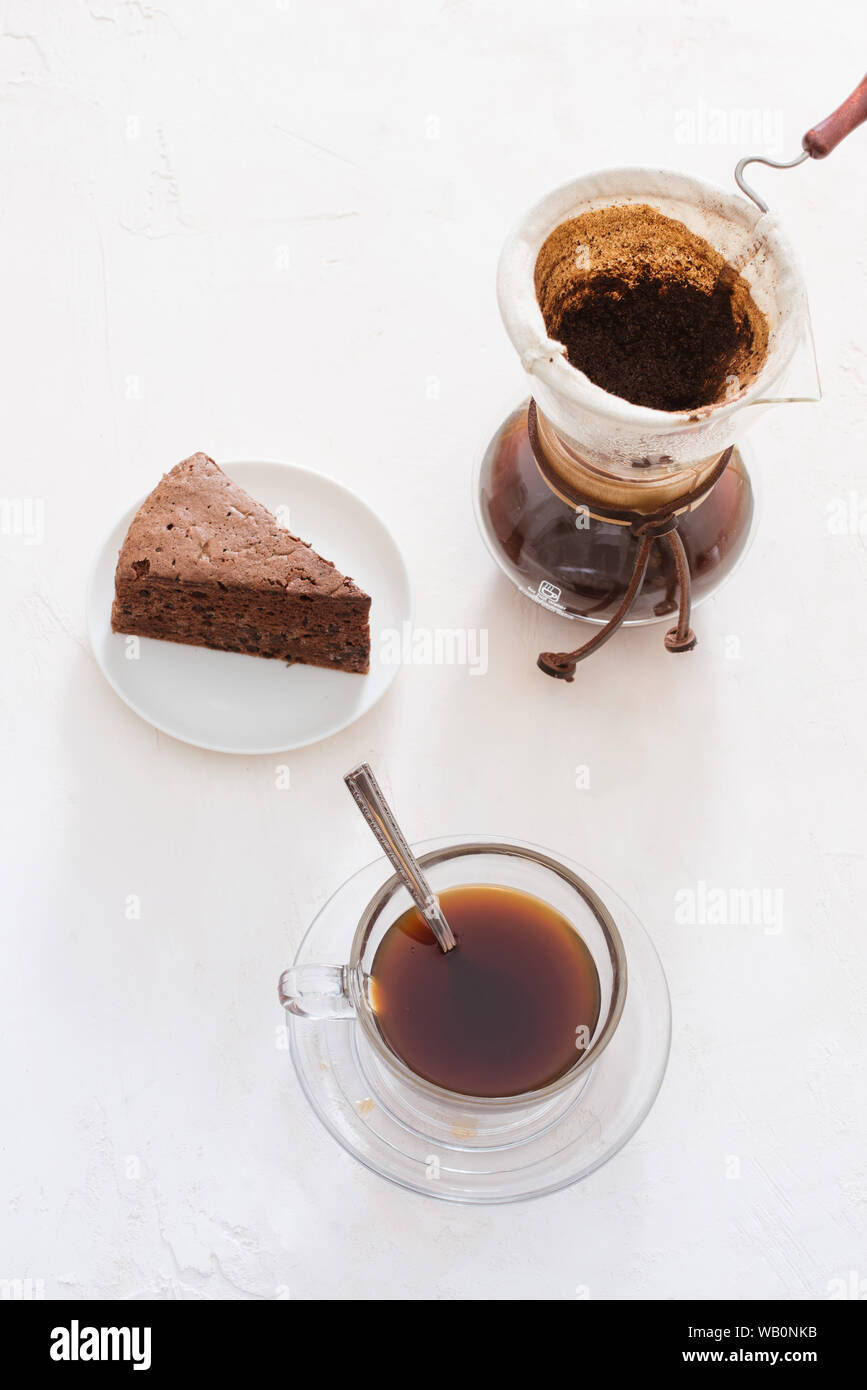 Drip coffee (dripper) and drip ground coffee with glass drip pot, cup