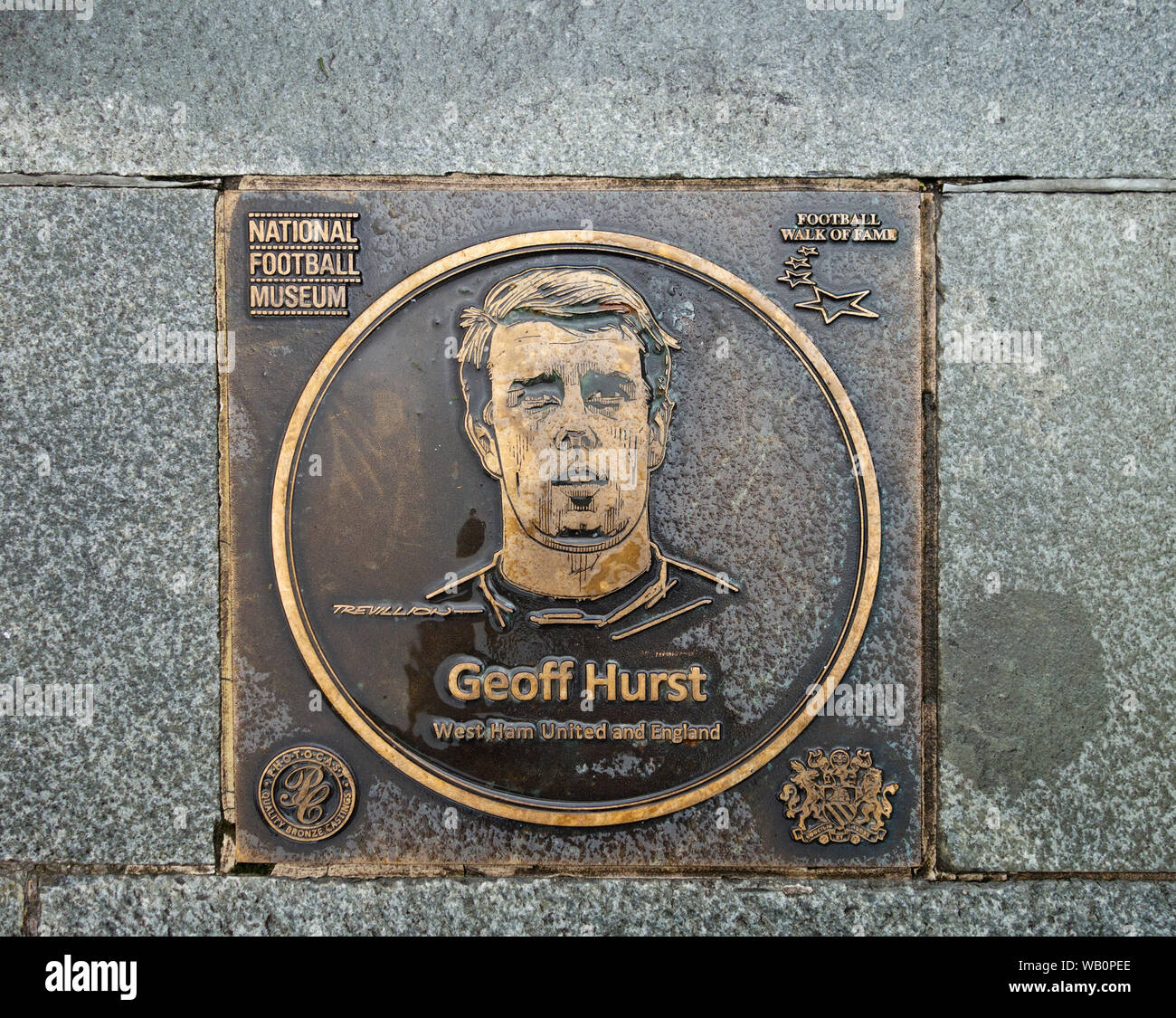 bronze plaque of england fotballer geoff hurst on the football walk of fame at the national football museum in manchester england uk Stock Photo