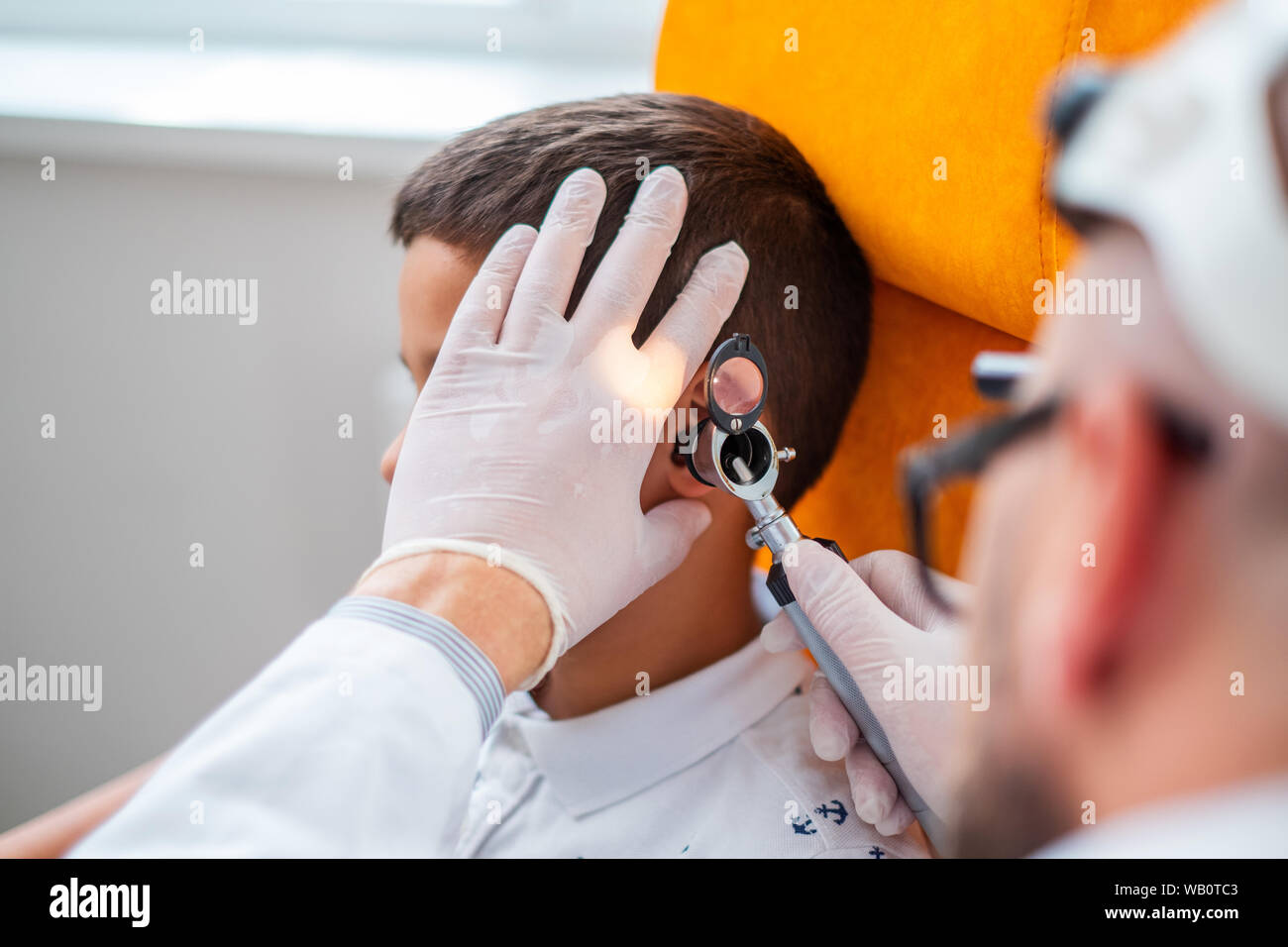 Boy at check-up at otolaryngologist Stock Photo