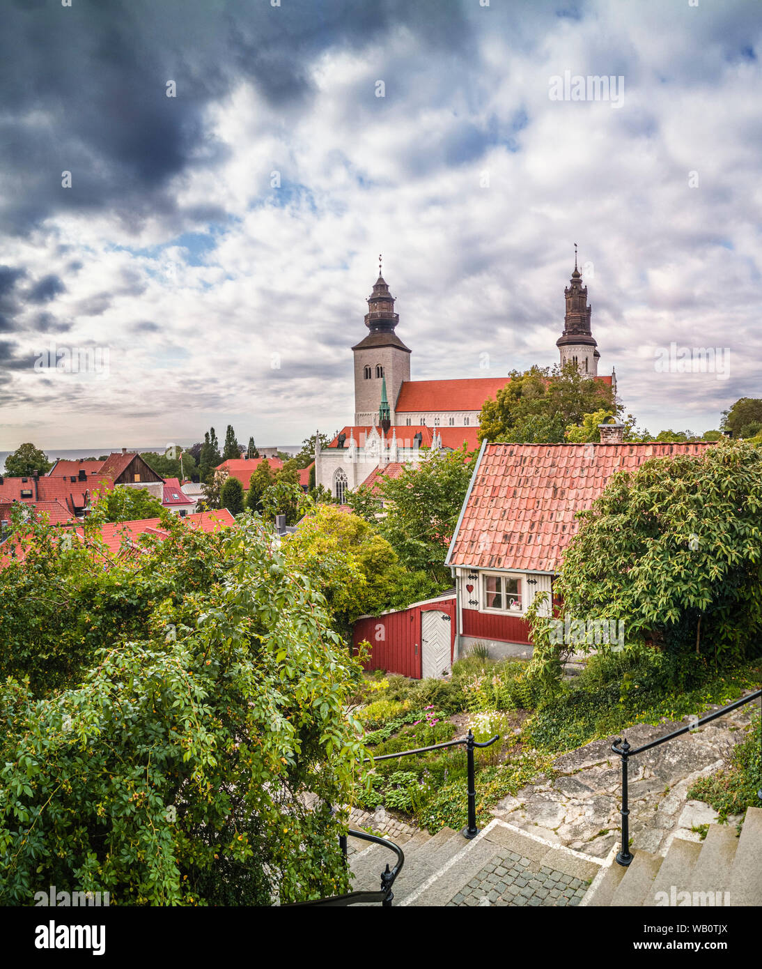 Old cottage and the cathedral. Visby, Gotland, Sweden, Scandinavia Stock Photo