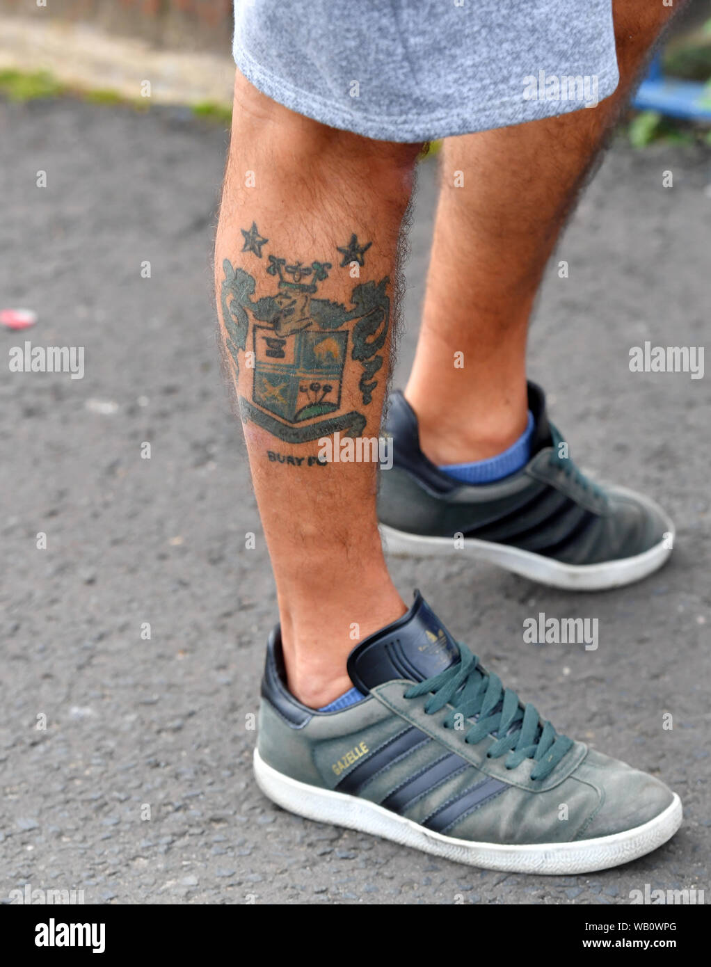 A view of a Bury fans' tattoo as he wait at the gates of Gigg Lane
