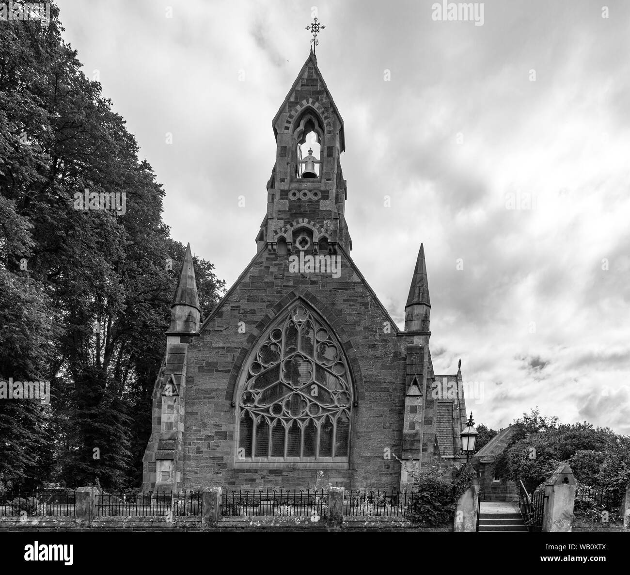 Alloway, Scotland, UK - July 19, 2019:  Maybole Rd, Alloway Ayr and Alloway Parish Church with its impressive gothic architectural design in the heart Stock Photo