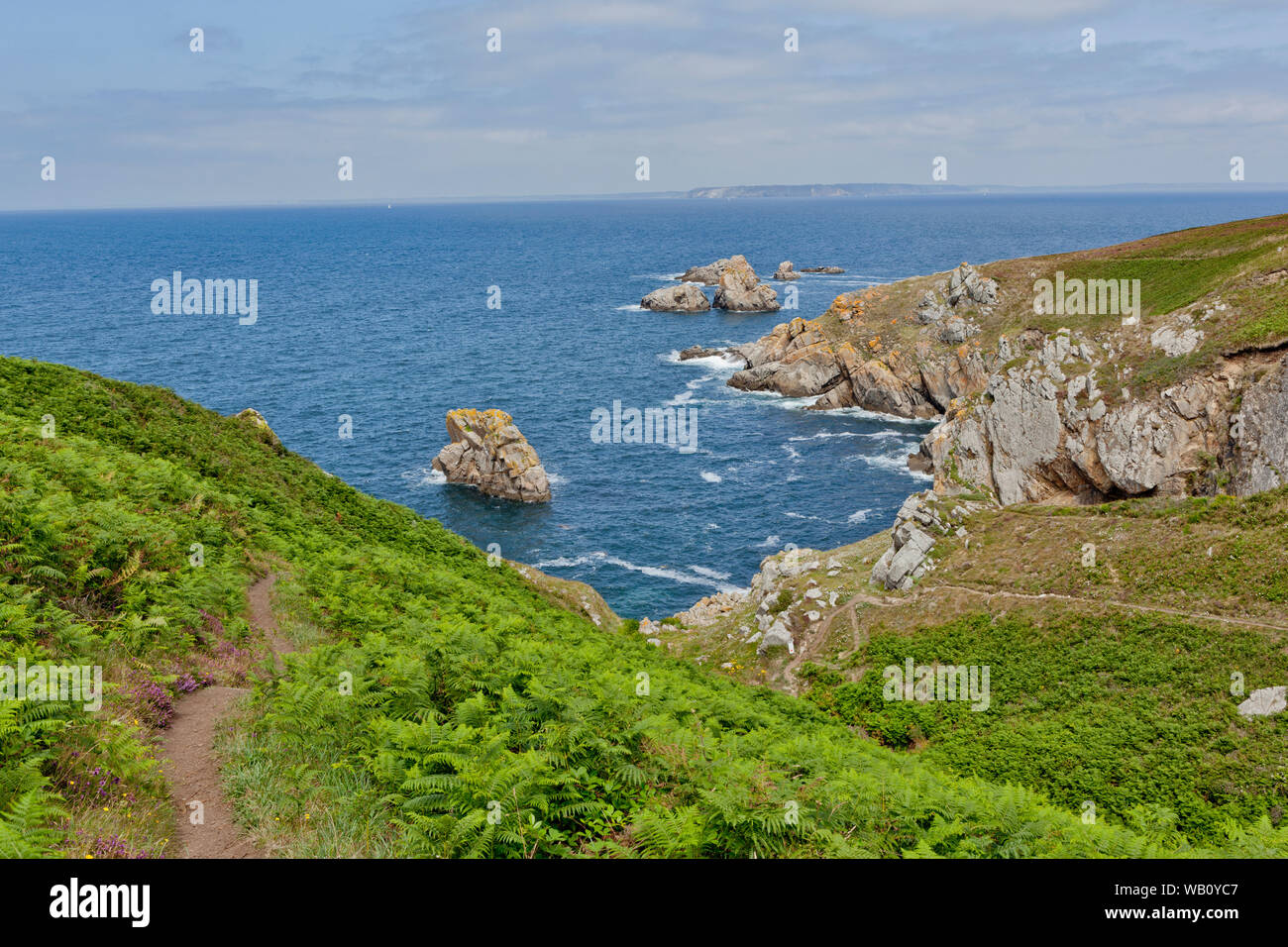 a costal path with lush green  on the Atlantic coast of Brittany called Pointe du Raz Stock Photo