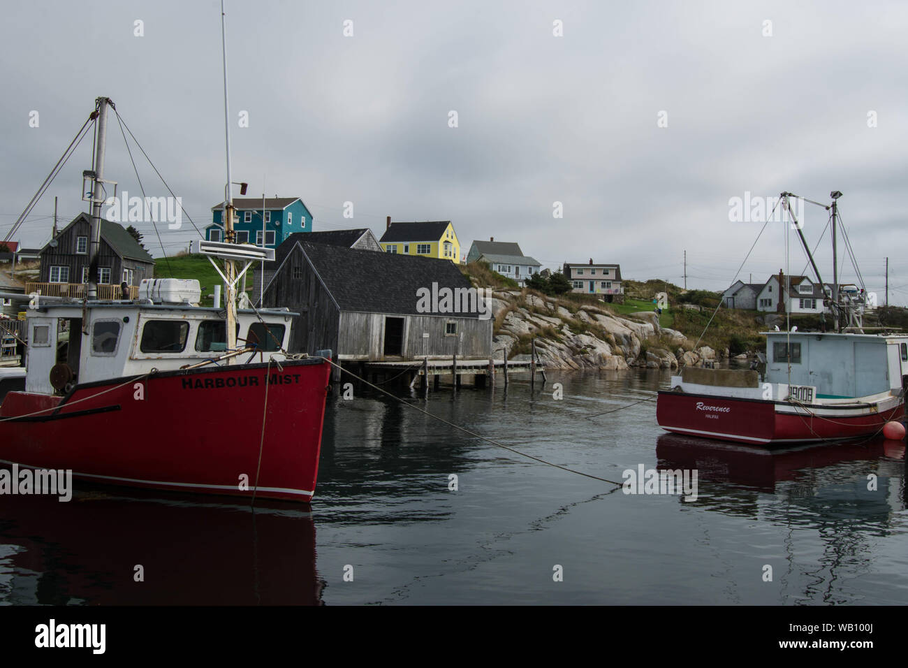 Fishing boats at Peggys Cove Halifax Nova Scotia Canada water lake
