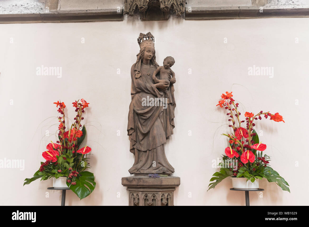 Statue of holy virgin Mary at late Gothic church 'Marienkapelle' in Würzburg, Germany Stock Photo