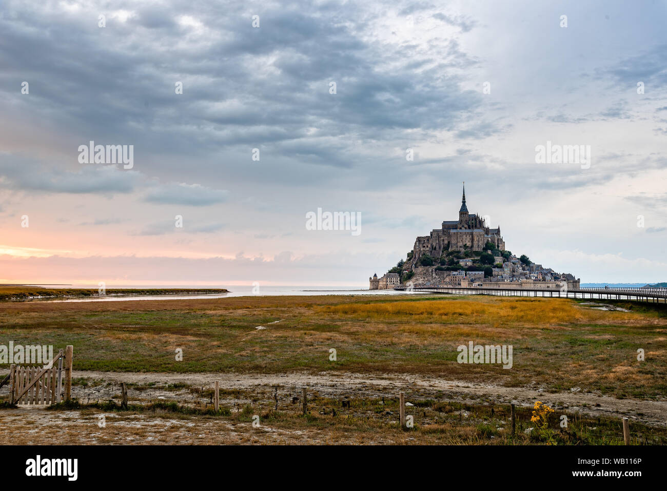 View of Mont Saint-Michel at sunset against sky Stock Photo