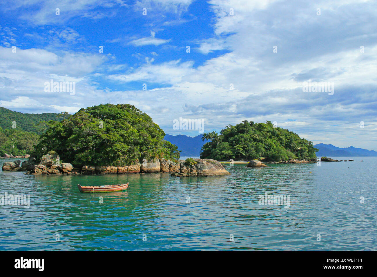 Natural reserve tropical islands at Ilha Grande, with forests and calm ocean waters Stock Photo