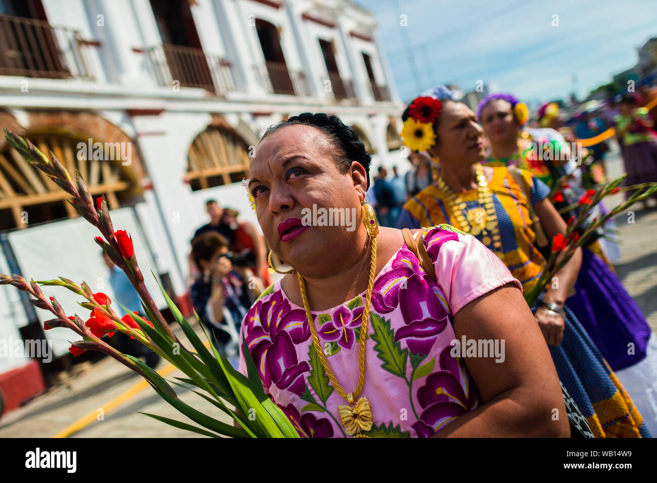 Mexican “muxes” (typically, homosexual men wearing female clothes) take part in the festival in Juchitán de Zaragoza, Mexico. Stock Photo