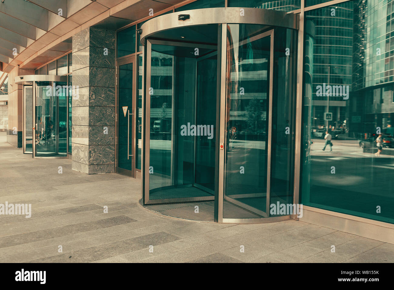 Curved doorway to the office, bank, corporation. Glass and metal doors Stock Photo
