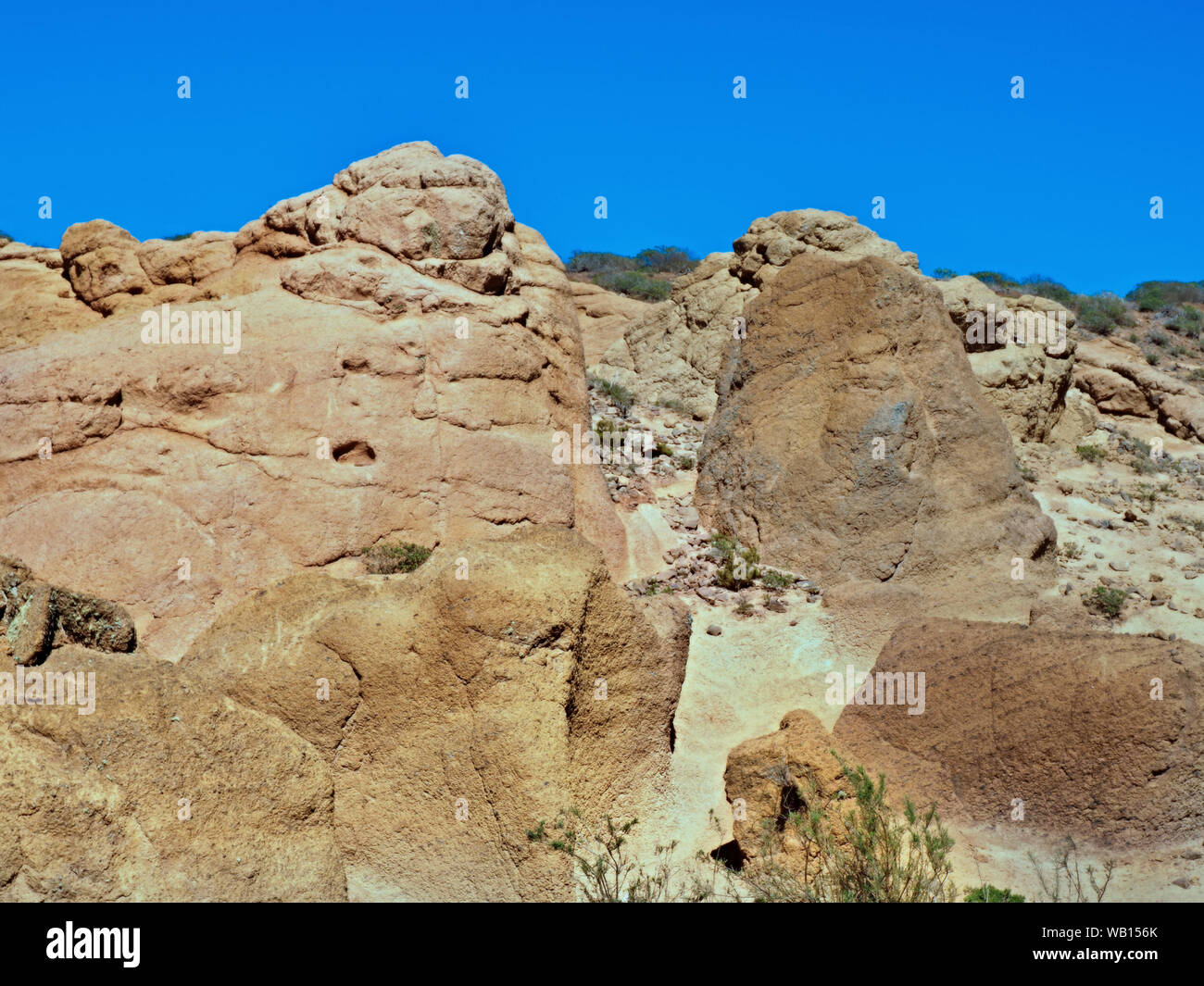 Lunar landscape of coarse and very light tufa and volcanic stones, in the Teno Mountains on the Canary Island of Tenerife. The wind and the weather ha Stock Photo