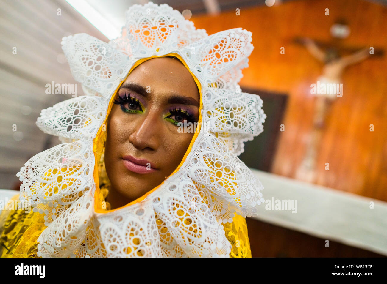 A Mexican “muxe” (typically, a homosexual man wearing female clothes) participates in the festival in Juchitán de Zaragoza, Mexico. Stock Photo