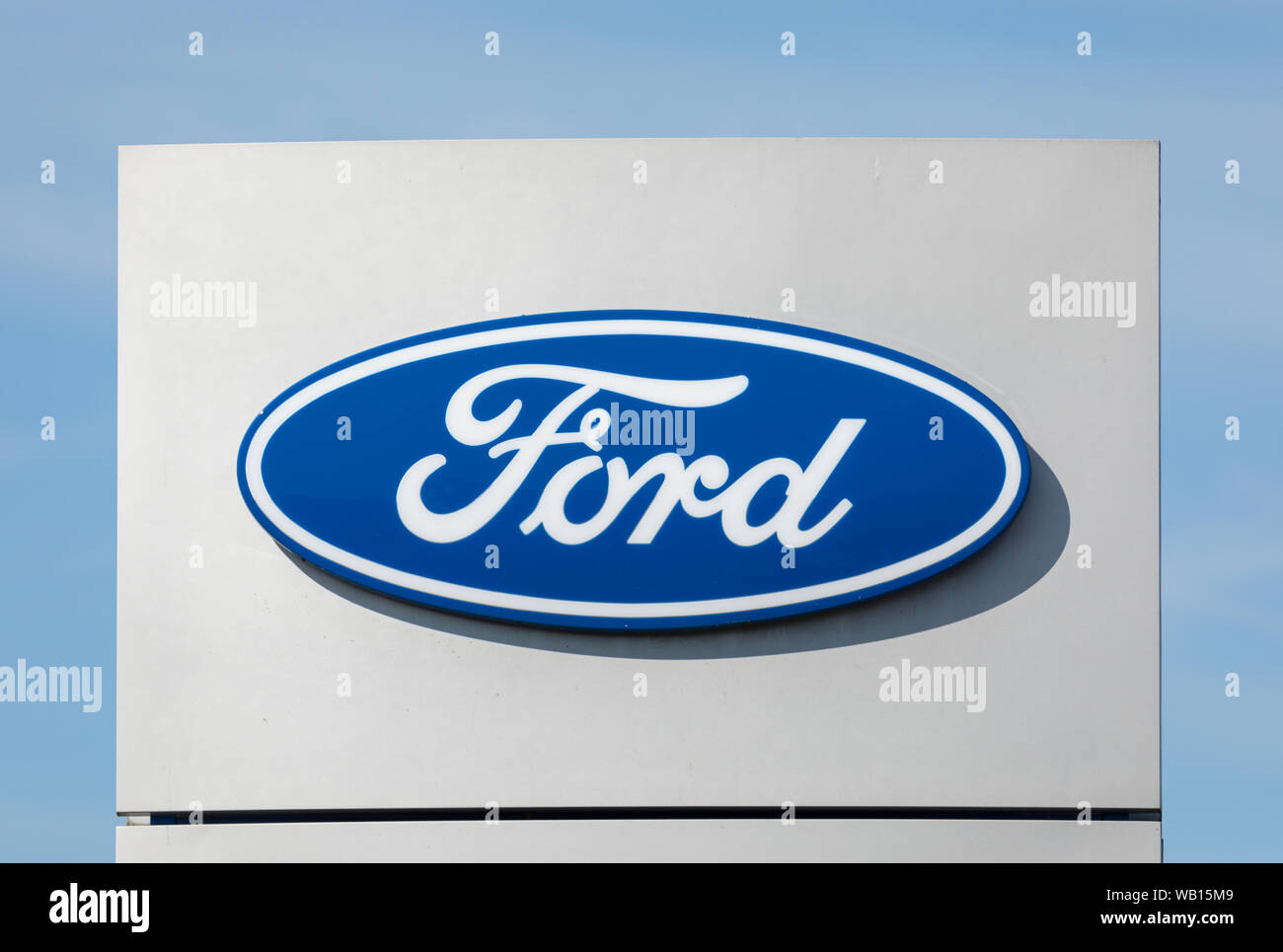 Stade, Germany - August 22, 2019: Logo on pole identifying a Ford Motor Company dealership Stock Photo