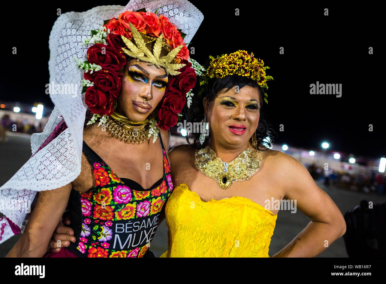 Mexican “muxes” (typically, homosexual men wearing female clothes) pose for a picture during the festival in Juchitán de Zaragoza, Mexico. Stock Photo