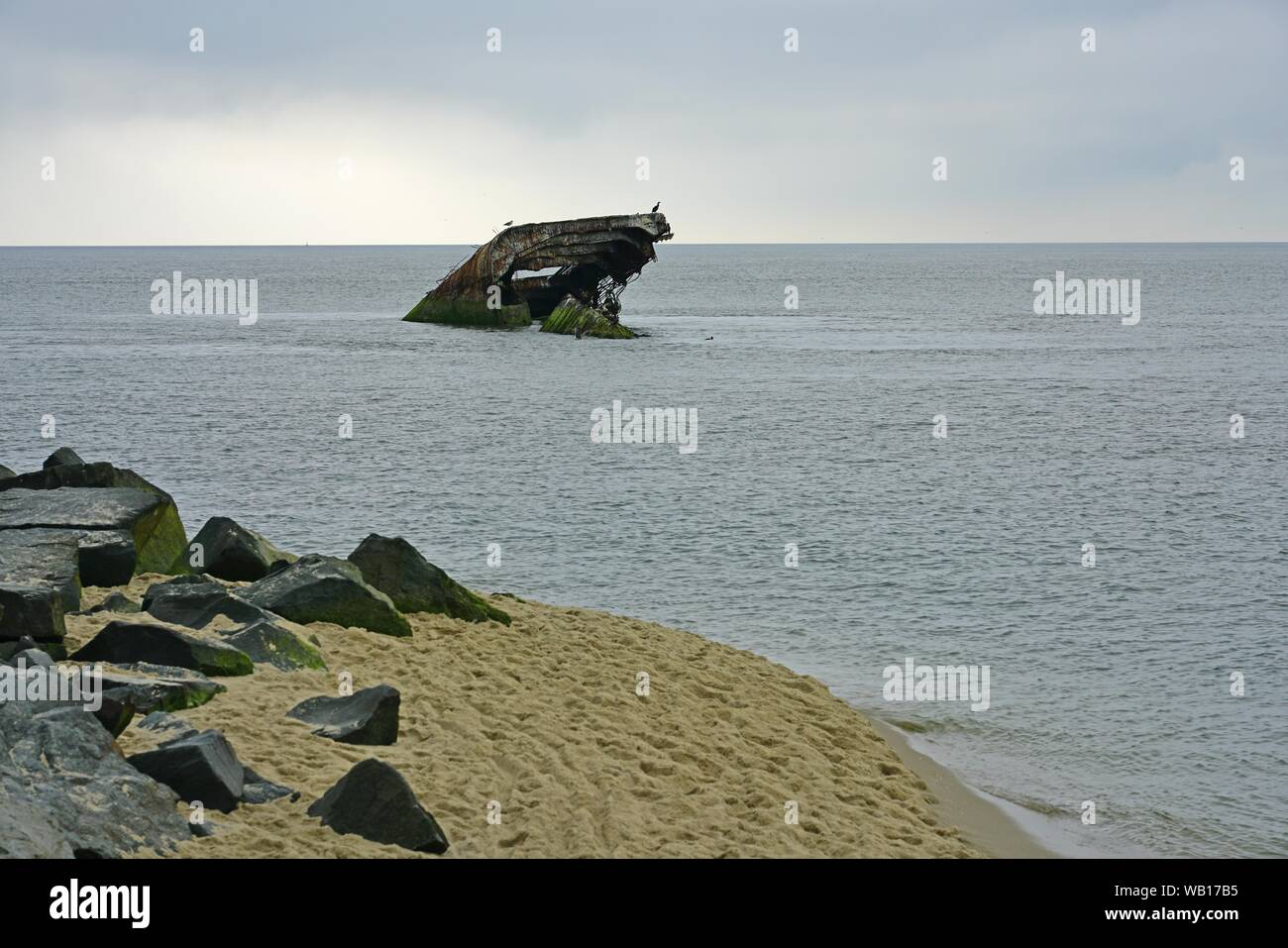 CAPE MAY, NJ -14 AUG 2019- View of the remains of the SS Atlantus, a World War I experimental concrete ship sunken off Sunset Beach in Cape May, New J Stock Photo