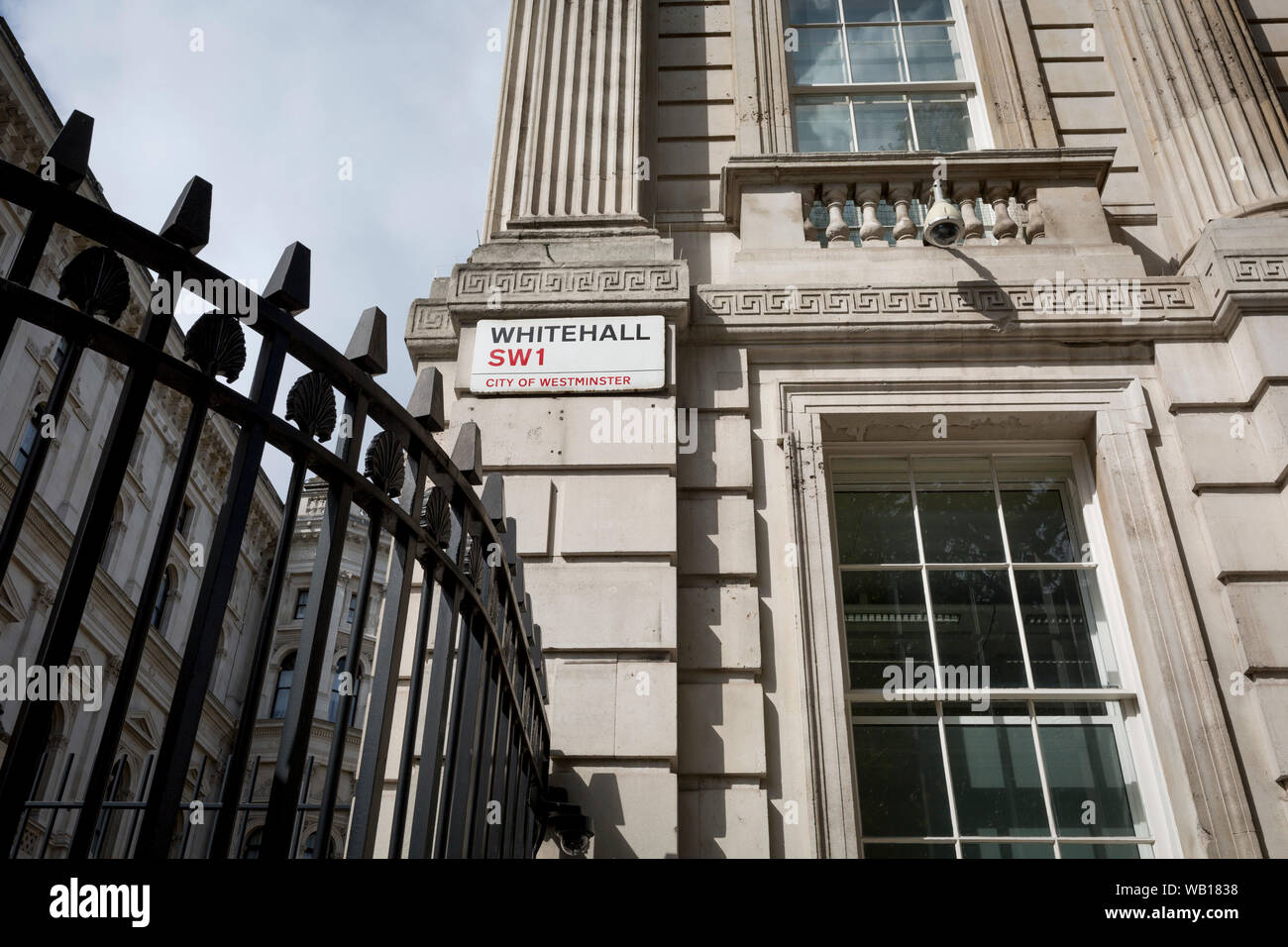 A signpost for Whitehall at the corner of Downing Street, the official residence and office of British Prime Minister Boris Johnson amnd the district in Westminster for British government offices, on 19th August 2019, in London, England. Stock Photo