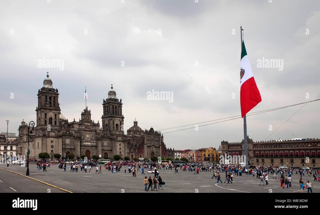 Plaza de la Constitucion, or El Zocalo in Mexico City with the Metropolitan Cathedral featuring on the left. The square is the third largest in the wo Stock Photo