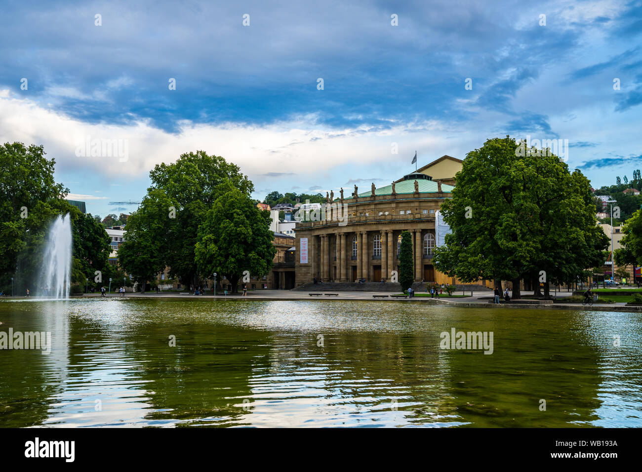 Stuttgart, Germany, August 15, 2019, Beautiful ancient opera house building in downtown stuttgart at little lake water and fountain in schlosspark, pa Stock Photo