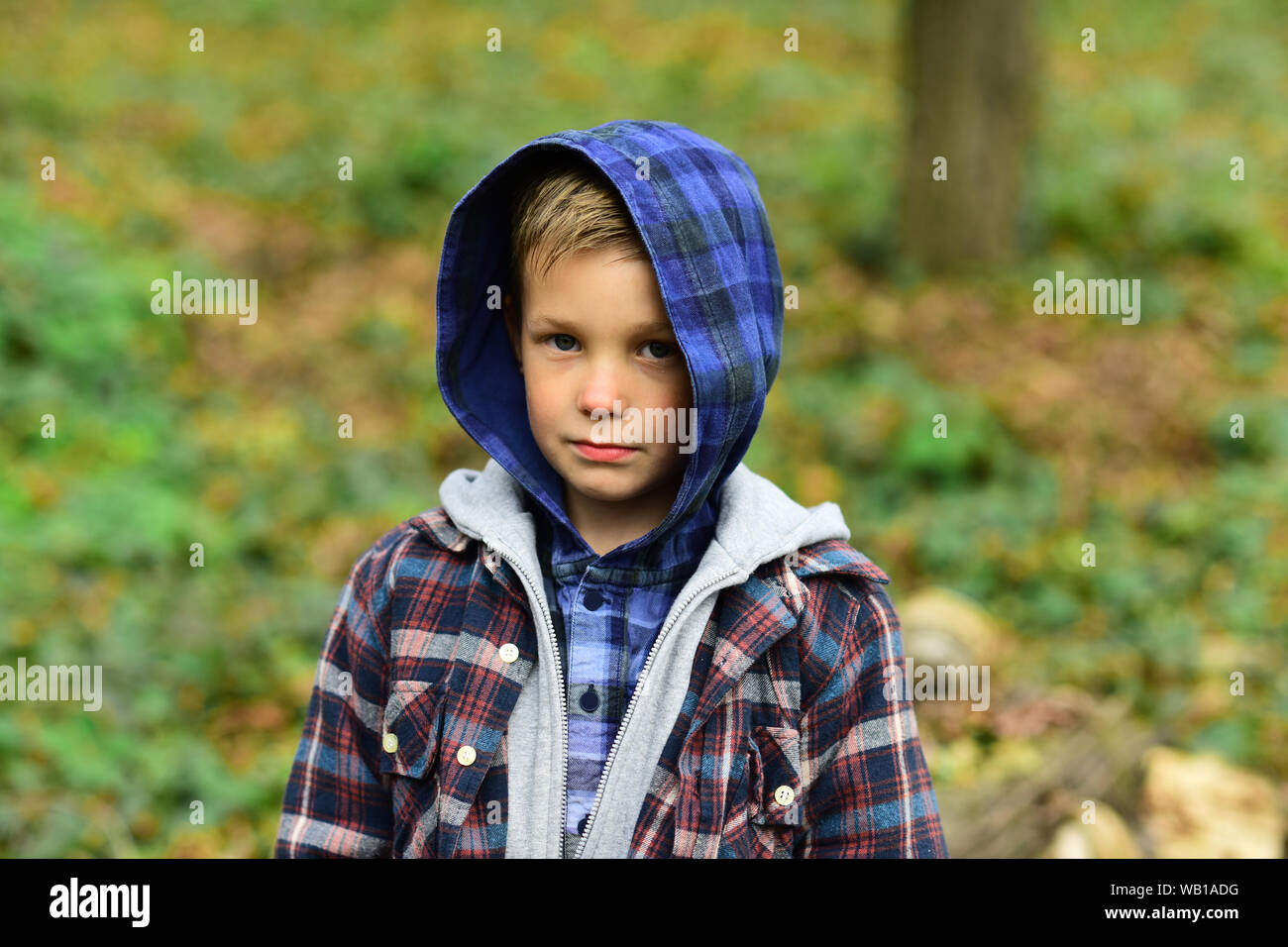 Casual and boyish. Small child in casual wear. Small boy play outdoor.  Little child on natural landscape. Small but mighty Stock Photo - Alamy