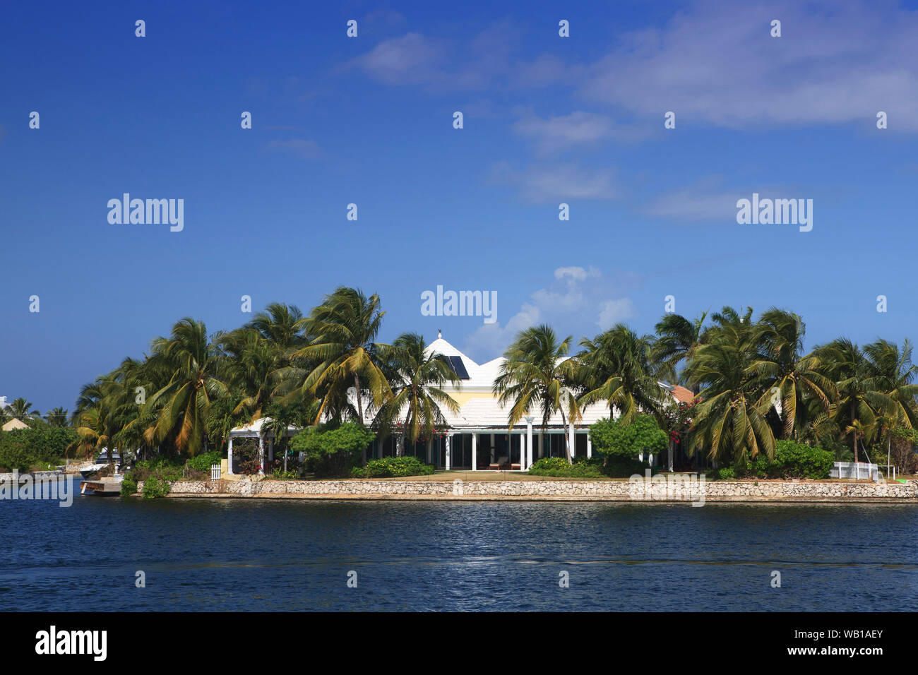 Internal waterway on Grand Cayman with large house Stock Photo