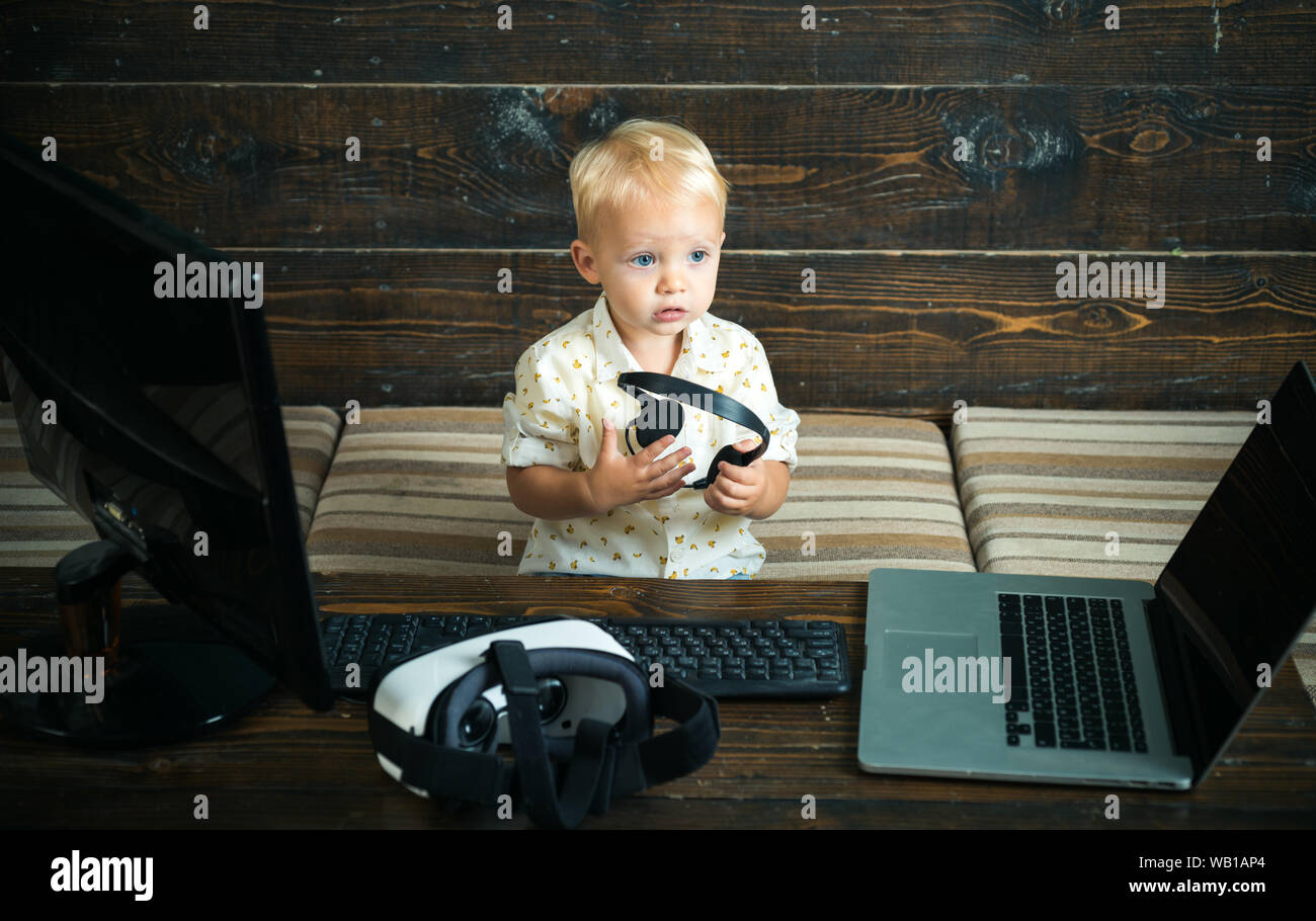 Little boy learn using computer technology. Early development with new ...