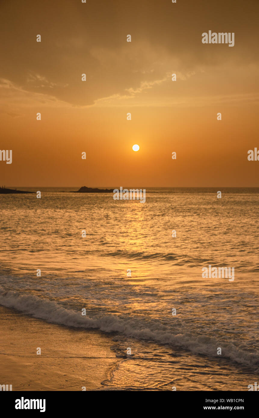 Colorful clouds on dramatic sunset sky Stock Photo - Alamy