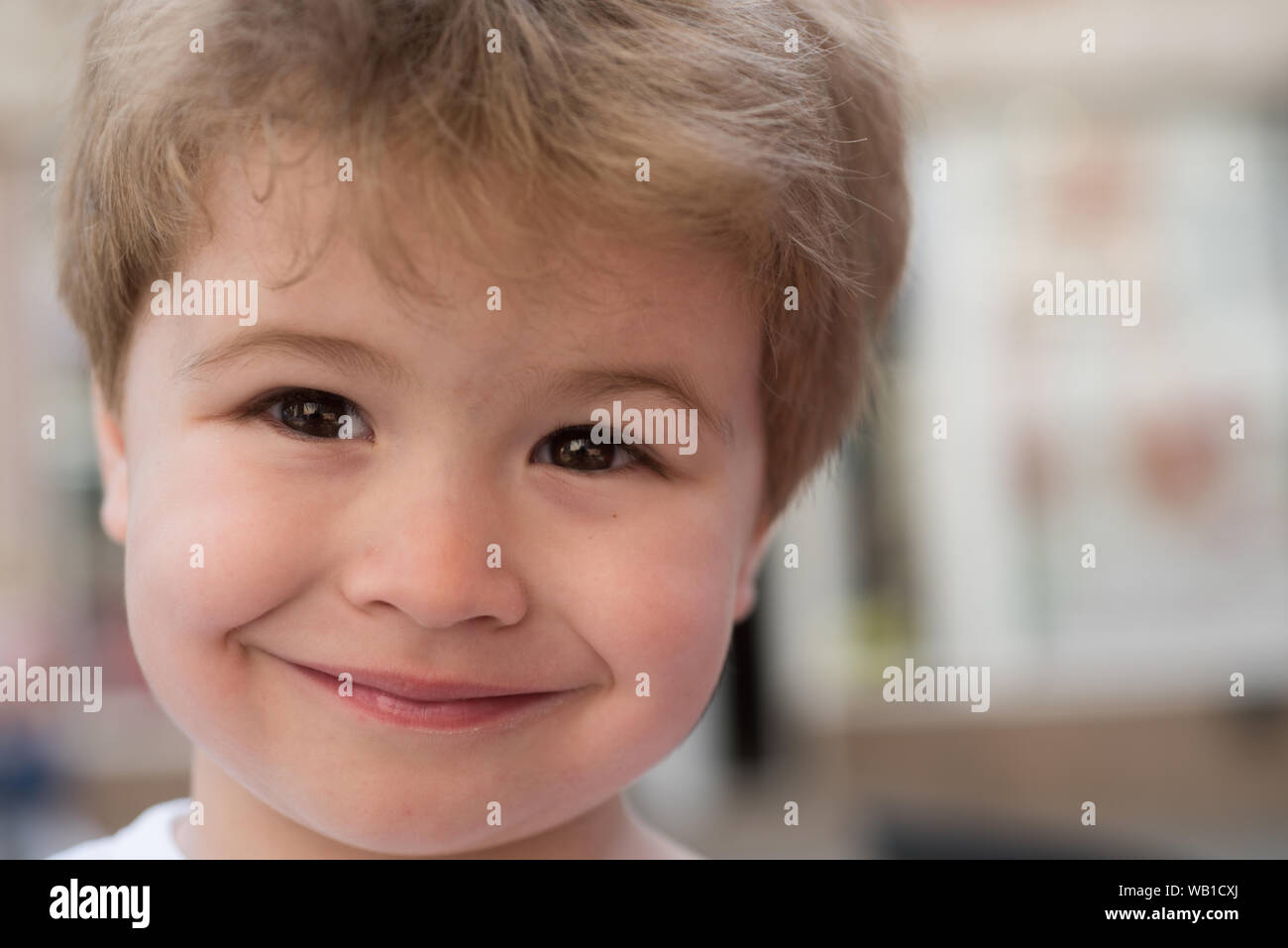 Choosing a hairstyle that fits my face shape. Little child with stylish  haircut. Little child with short haircut. Small boy with blond hair.  Healthy h Stock Photo - Alamy