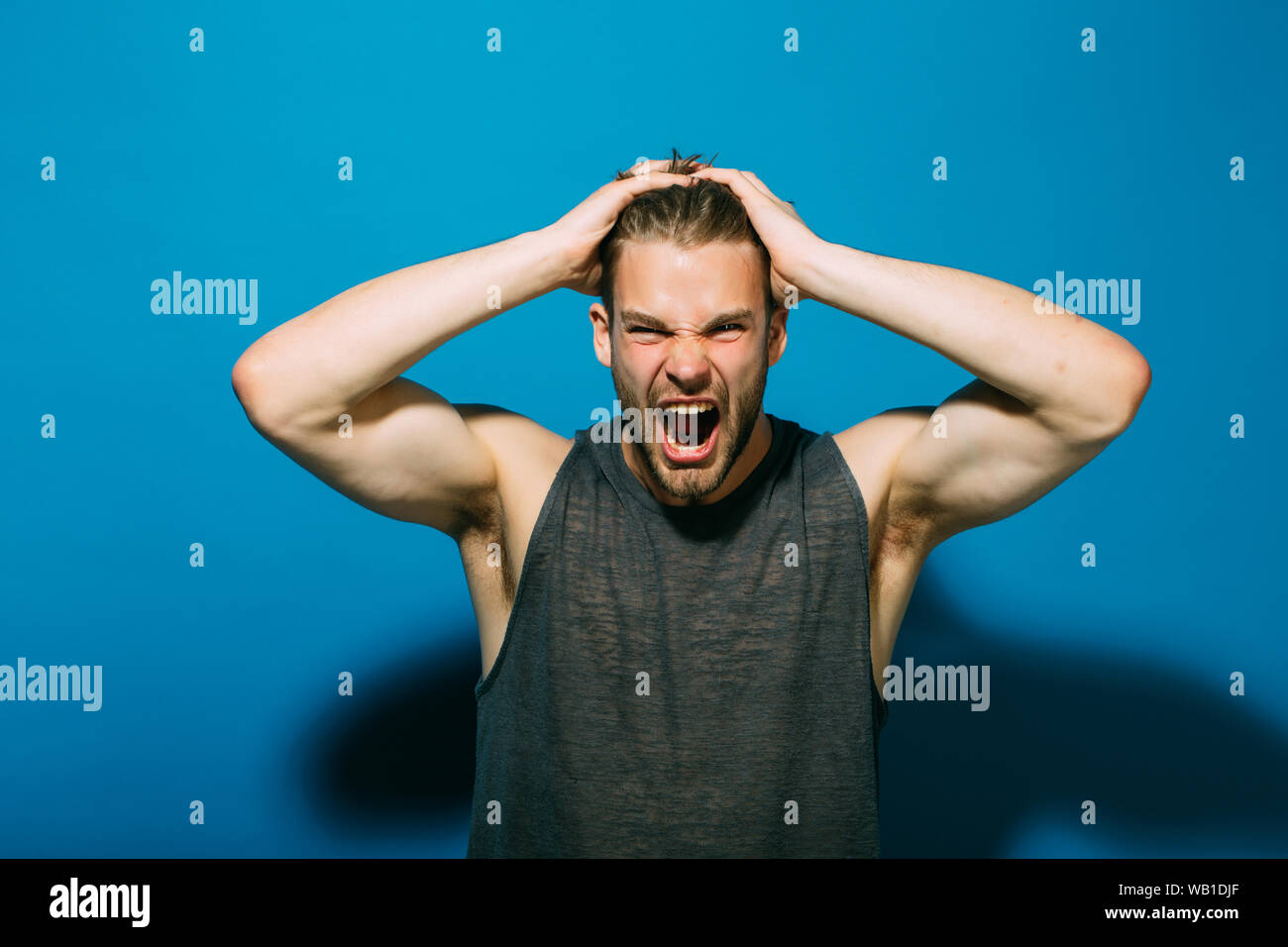 Stress concept. Stressed man pull out hair on head of stress. Handsome man  shout with stress. Give your stress wings and let it fly away Stock Photo -  Alamy