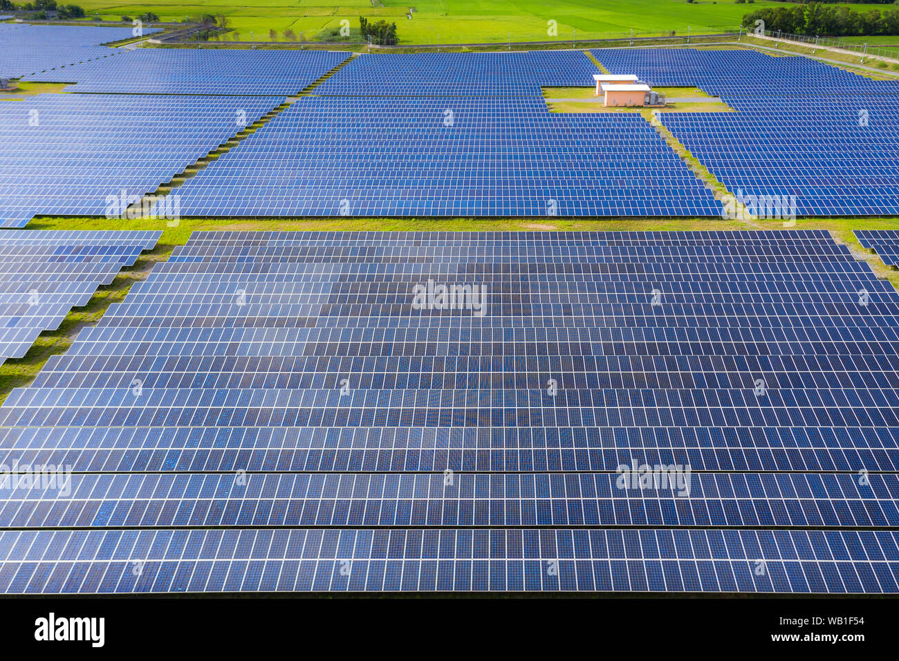 Solar energy farm producing clean renewable energy from the sun . Thousands of solar panels