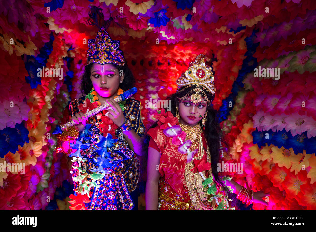 DHAKA, BANGLADESH - AUGUST 23 : Hindu devotees parade as they take part in the celebrations of Janmashtami, a festival marking the birth of Hindu deit Stock Photo